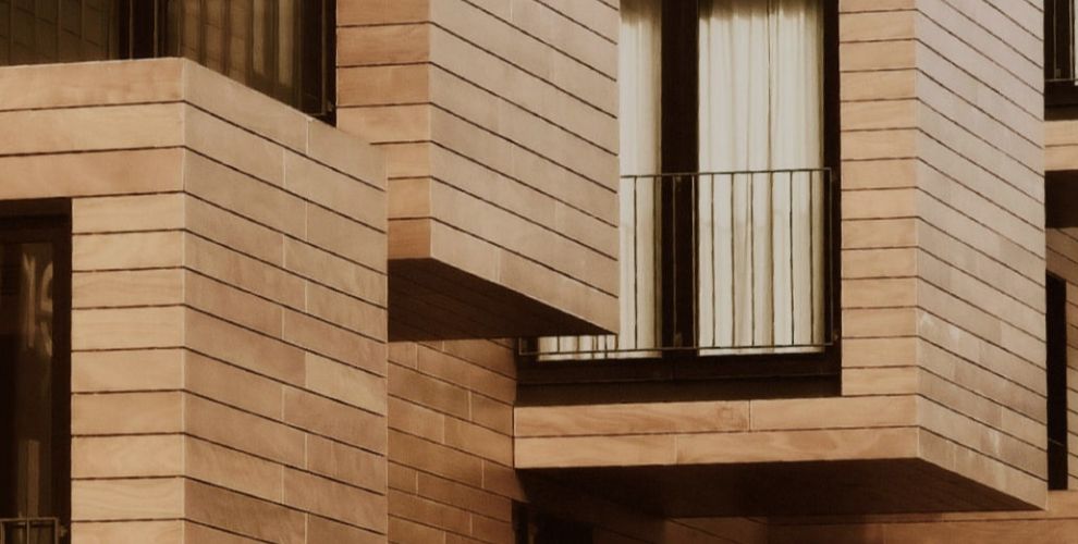 Résidence avec une façade design en bois
